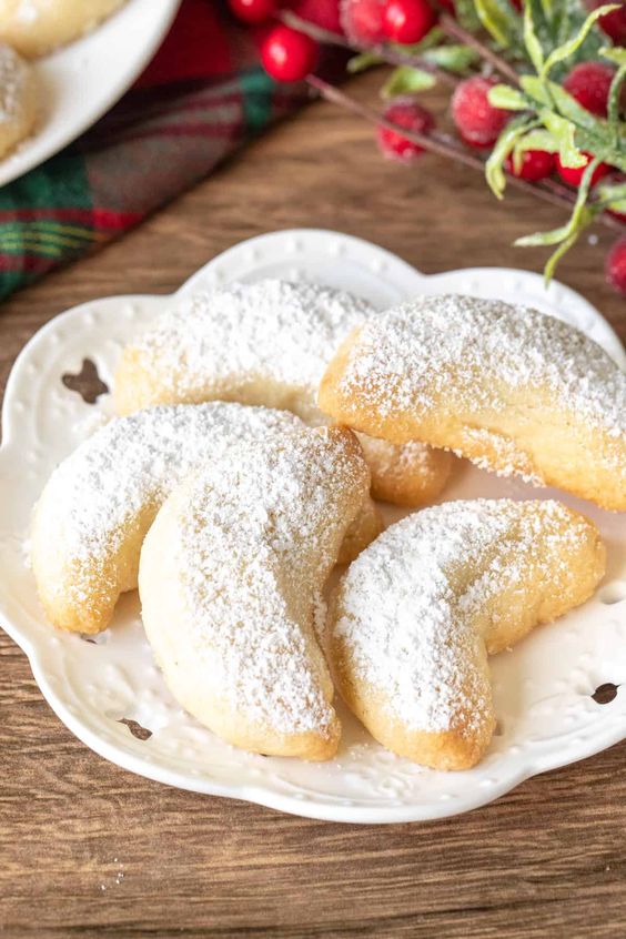 Divine sweets with almonds and vanilla on a decorative plate.