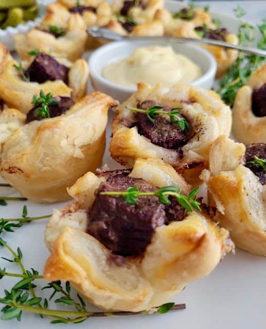 Puff pastry with soft meat cube and mushrooms.