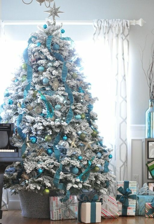 Christmas tree decorated in blue and silver