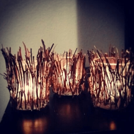 A simple Christmas candlestick made of twigs.