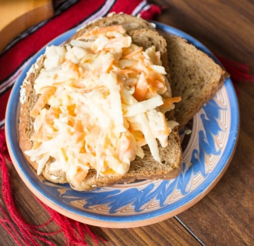 Slice of bread with celery spread.