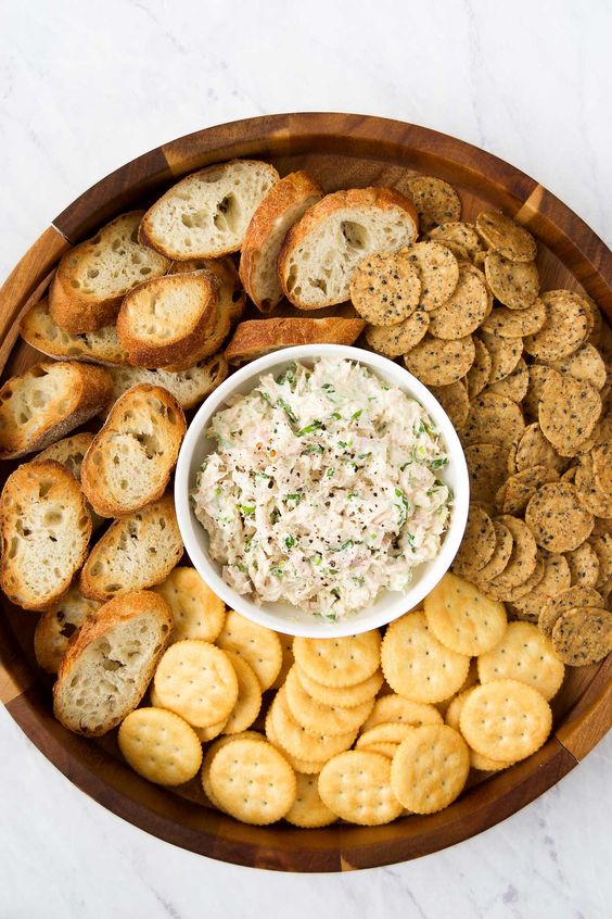 Crunchy crackers stacked around a delicious celery spread.