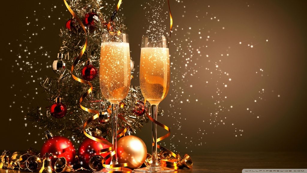 New Year background with decoration of flasks and two glasses full of champagne.