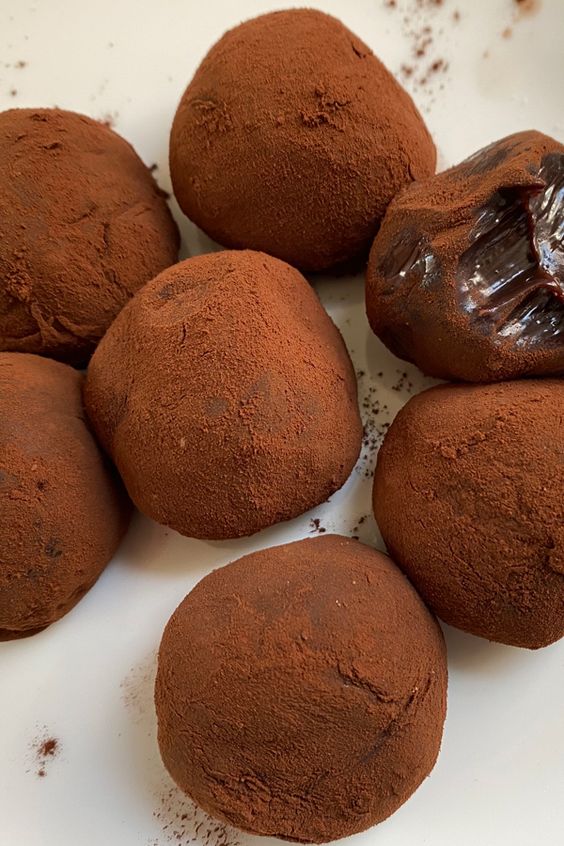 Balls with chocolate and condensed milk coated in cocoa.