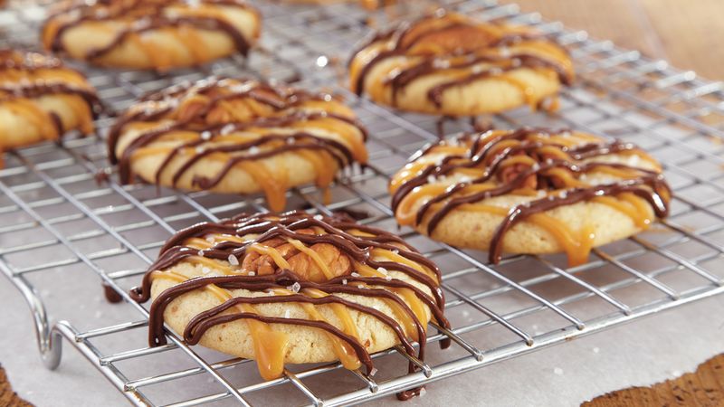 Christmas cookies decorated with nuts and caramel.