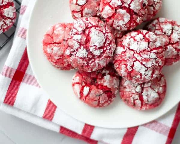 Cherry cookies with sugar on a plate.