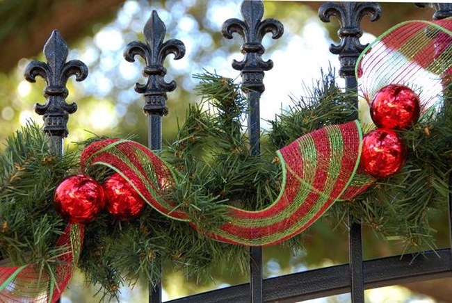 Christmas decorated fence.