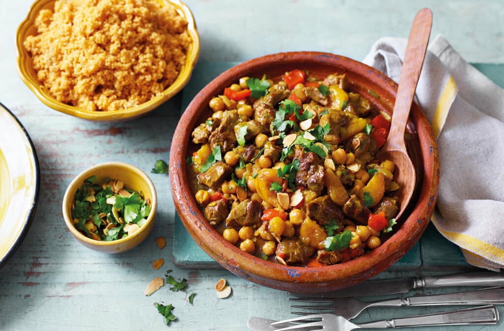 Traditional Moroccan dish lamb tagine with couscous.