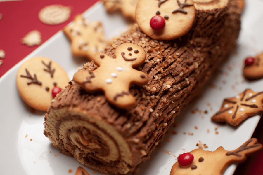 A chocolate log, as the sweet spot of a Christmas feast.