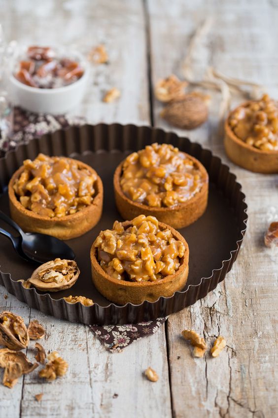 Sweet cupcakes full of nuts with caramel.