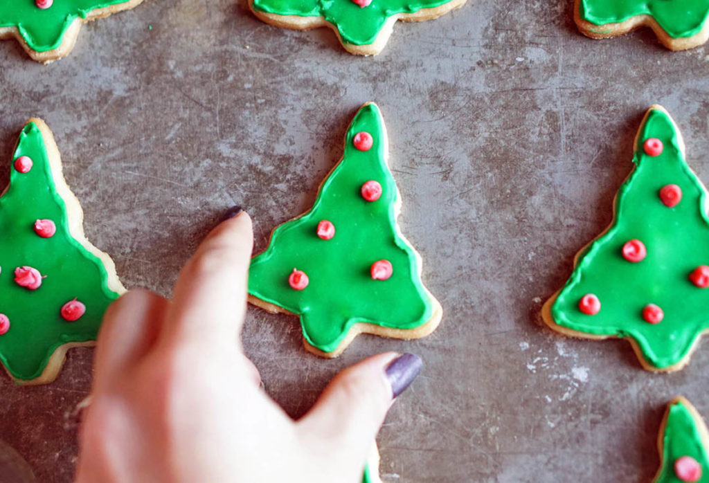 Christmas trees decorated with edible colors in a tube.