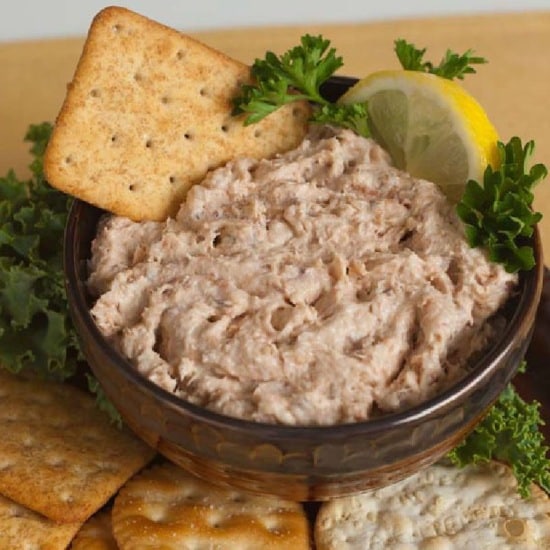 Bowl with fish fillet spread.