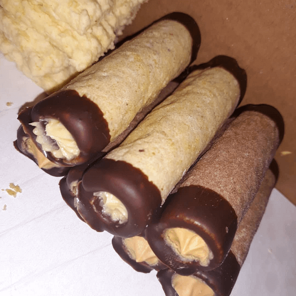 filled tubes decorated with chocolate