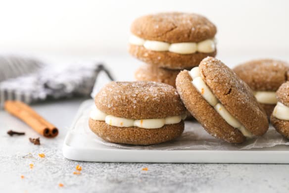 Gingerbread cookies made of rye flour filled with butter cream with mascarpone and orange peel.