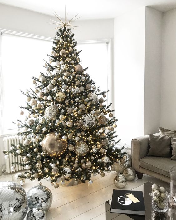 Elegant Christmas tree with gold and silver ornaments