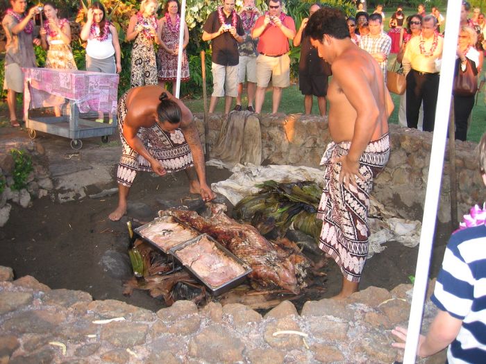 Traditional preparation of Hawaiian Christmas food.