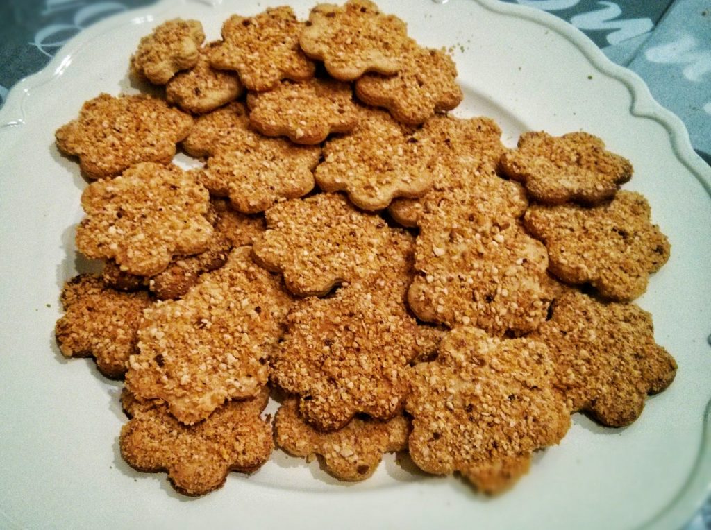 Lemon cookies sprinkled with nuts.