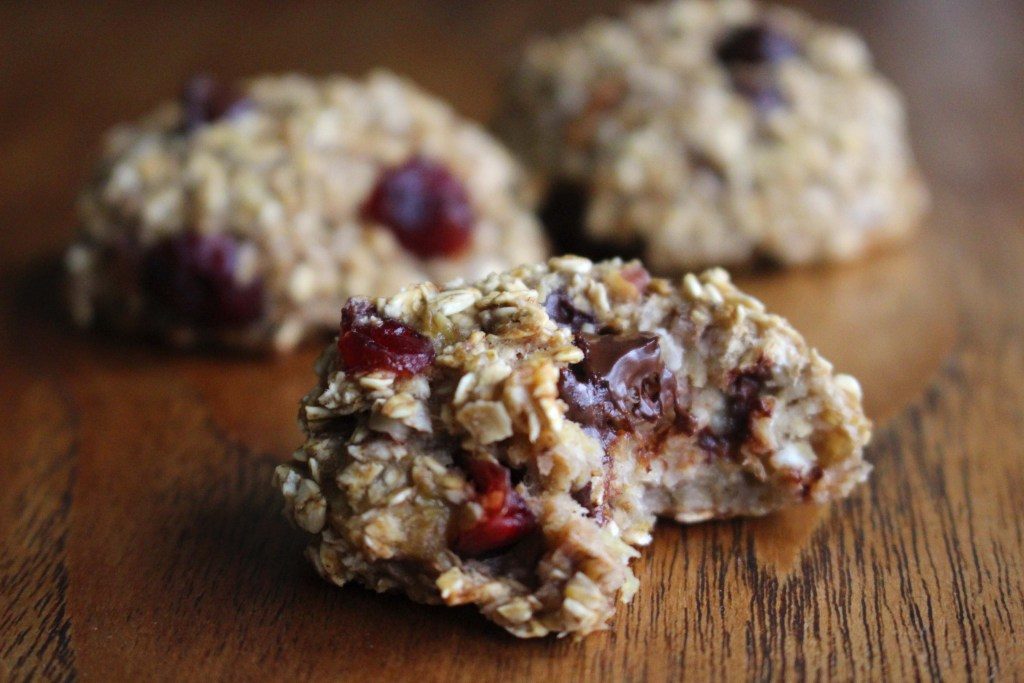 Honey oat patties with raisins on a wooden base