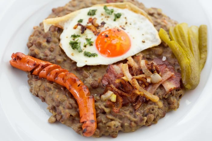 Lentils with egg and sausage.