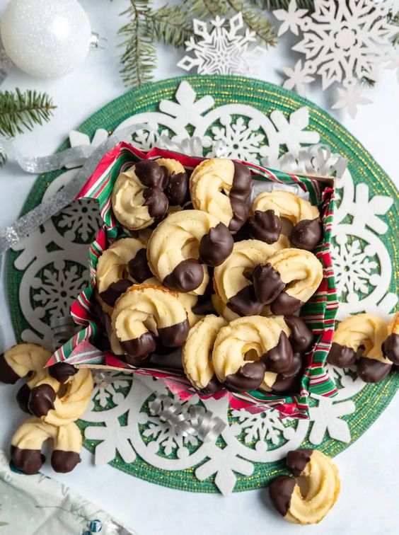 Beautifully decorated candies with nuts and dipped in chocolate.