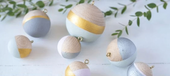 Scandi look wooden Christmas decorations in pastel colors.