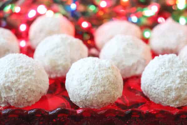 Pecan Christmas balls coated in powdered sugar.