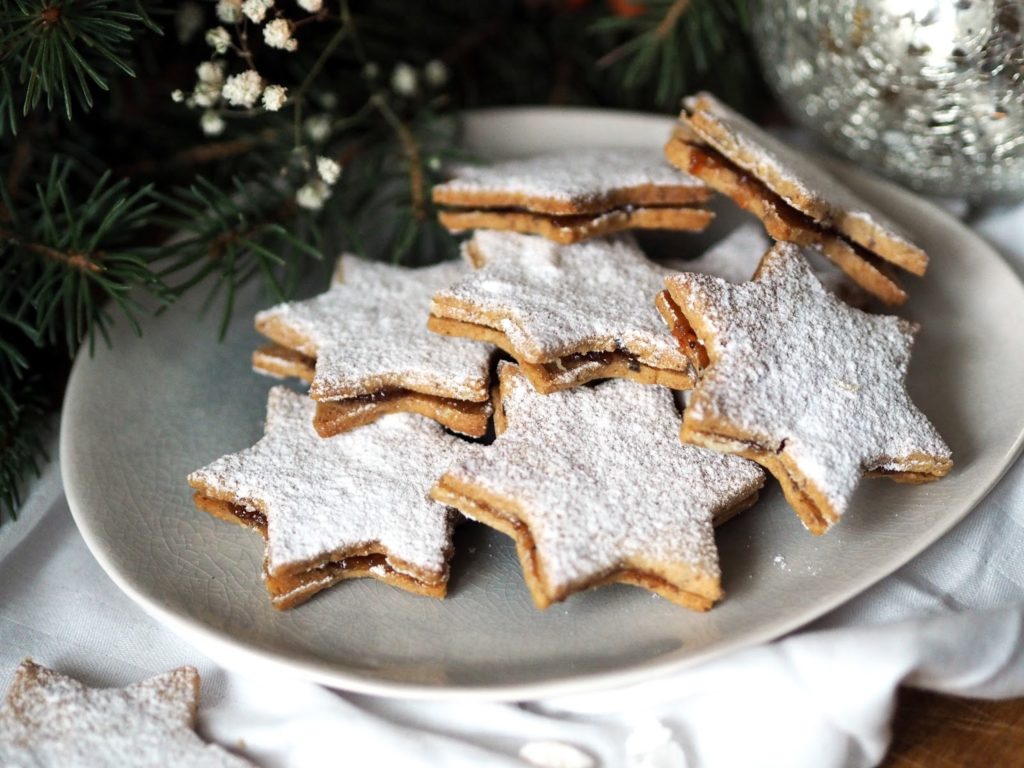 Star-shaped poppy candy sprinkled with sugar on a plate.