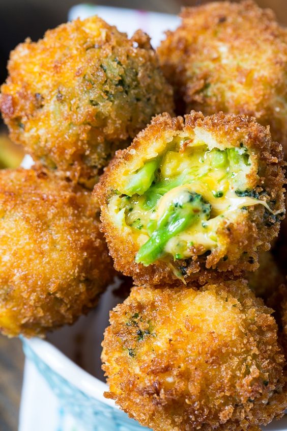 Fried balls with cheese and broccoli.