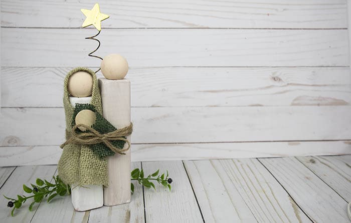 Nativity figures made of wooden prisms and balls.