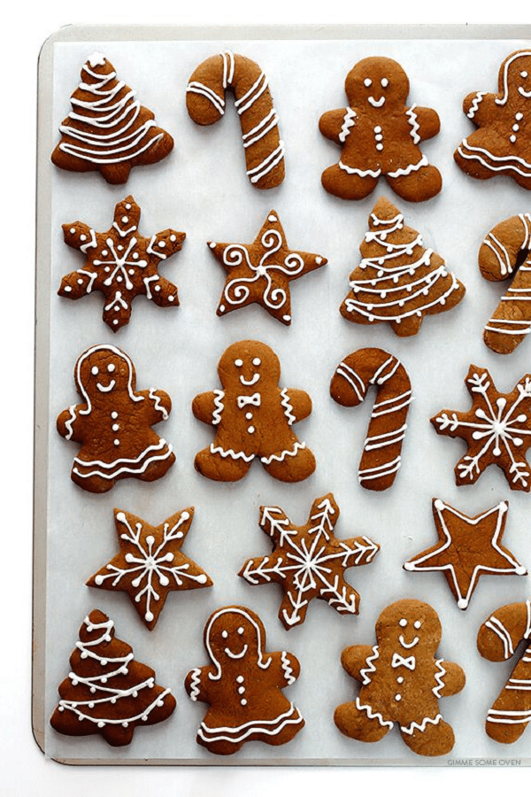 soft Christmas gingerbread cookies with decorations on the tin