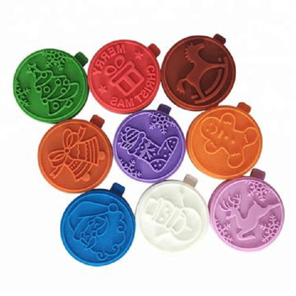 Colorful round stamps with Christmas motifs.