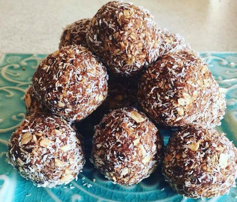 unbaked oatmeal balls arranged in a pyramid