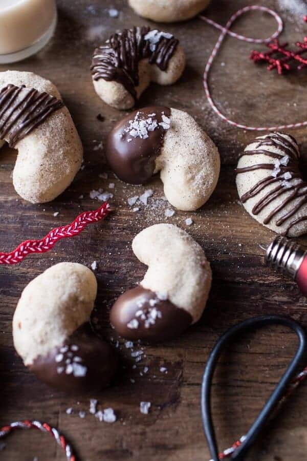 Vanilla rolls with roasted cashews decorated with chocolate.