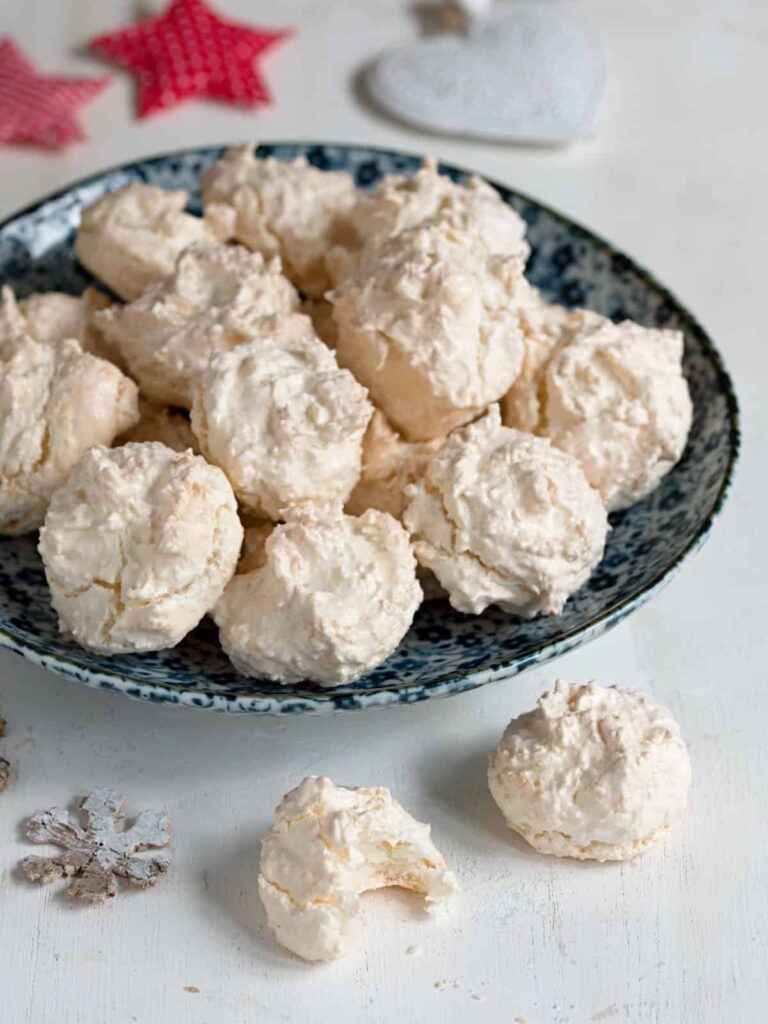 Meringue with coconut on a plate.