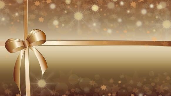 Beige cartoon image with golden big bow and stars.